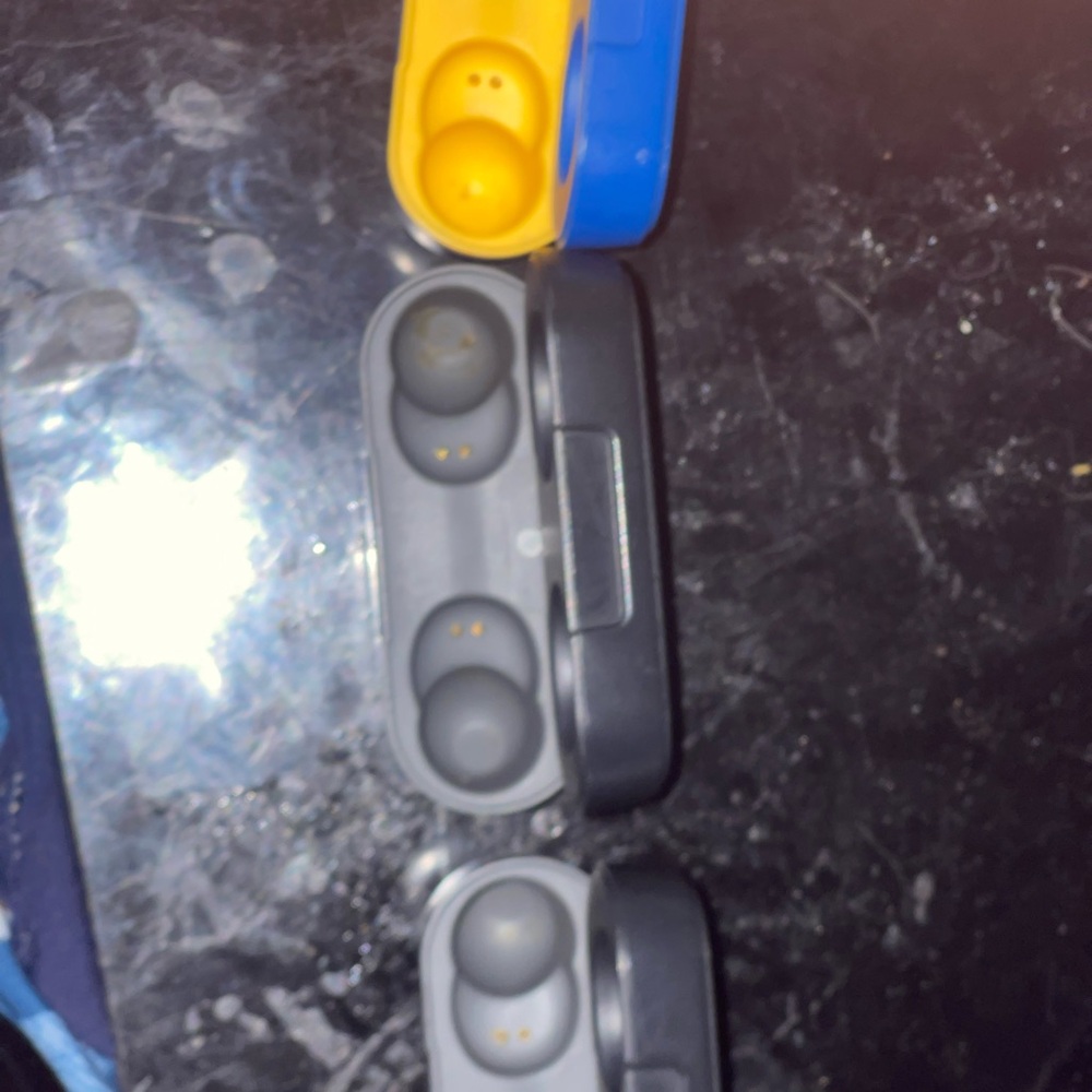 Gray and Yellow Wireless Earbuds